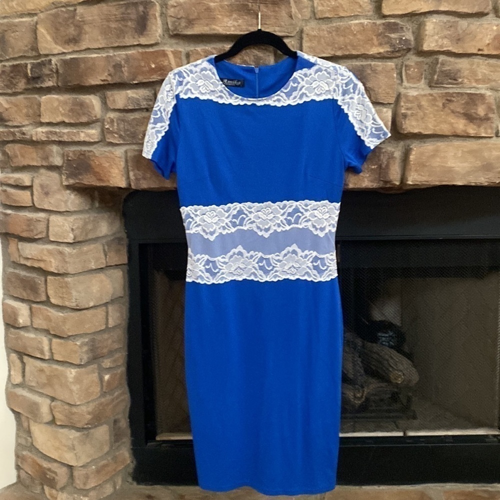 Amika Royal blue and white lace dress. Large Pit to Pit 16.  Length is 39.
